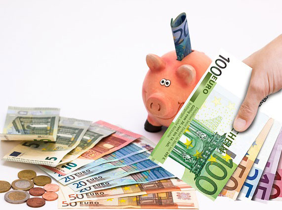 Euros being saved in a piggy bank 