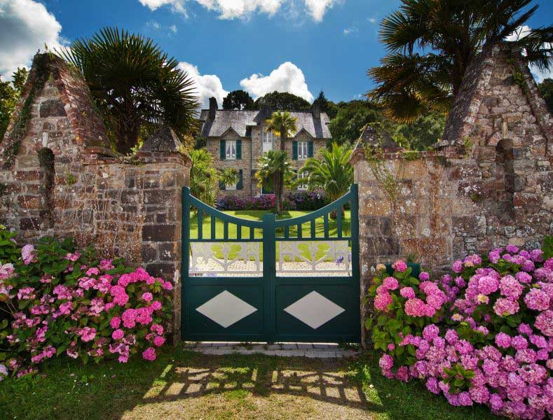 Gate leading to a house, typically French style home